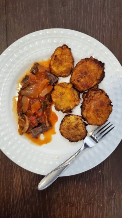 Caribbean skirt steak and tostones with creole sauce