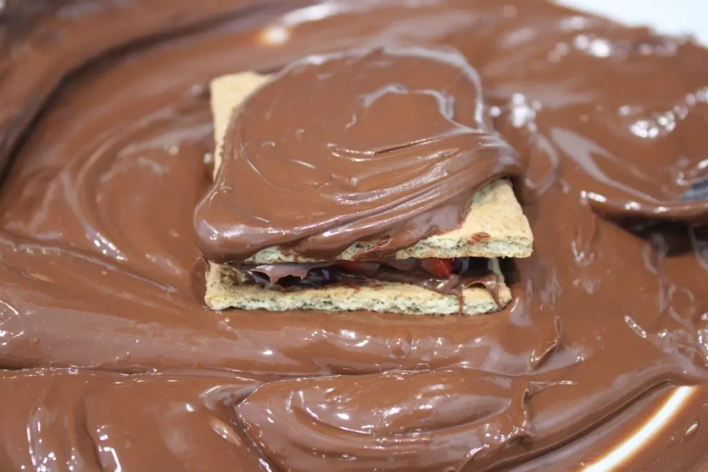 Covering the Graham Crackers in Melted Chocolate