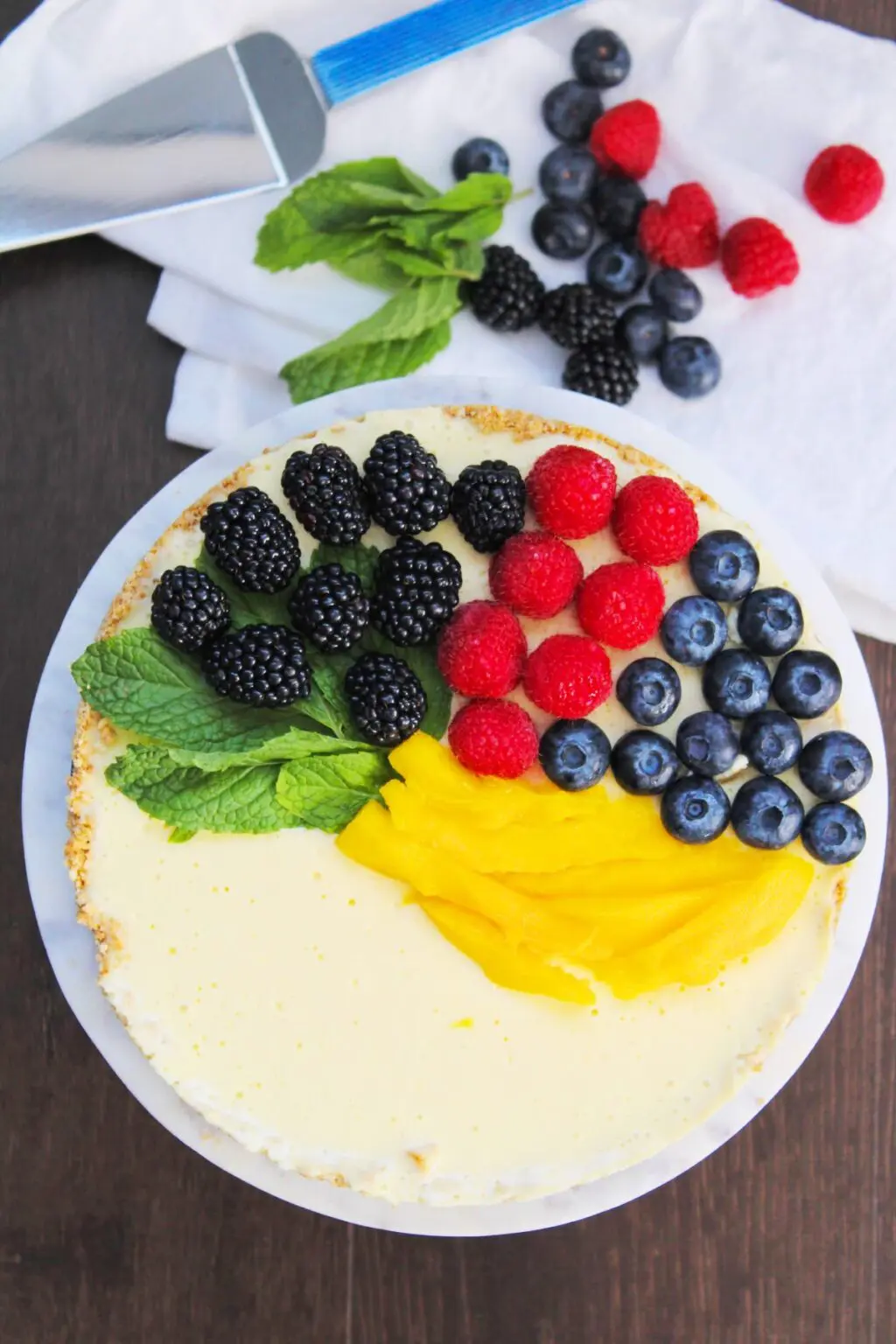 no-bake peach mango pie with cracker crust cream cheese mango peach filling blueberry raspberry topping summer