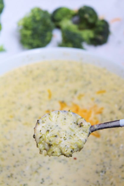 Serving Creamy Broccoli Soup with Cheddar Cheese