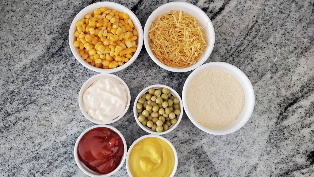 These are all of the toppings used for this traditional Brazilian hot dog recipe.