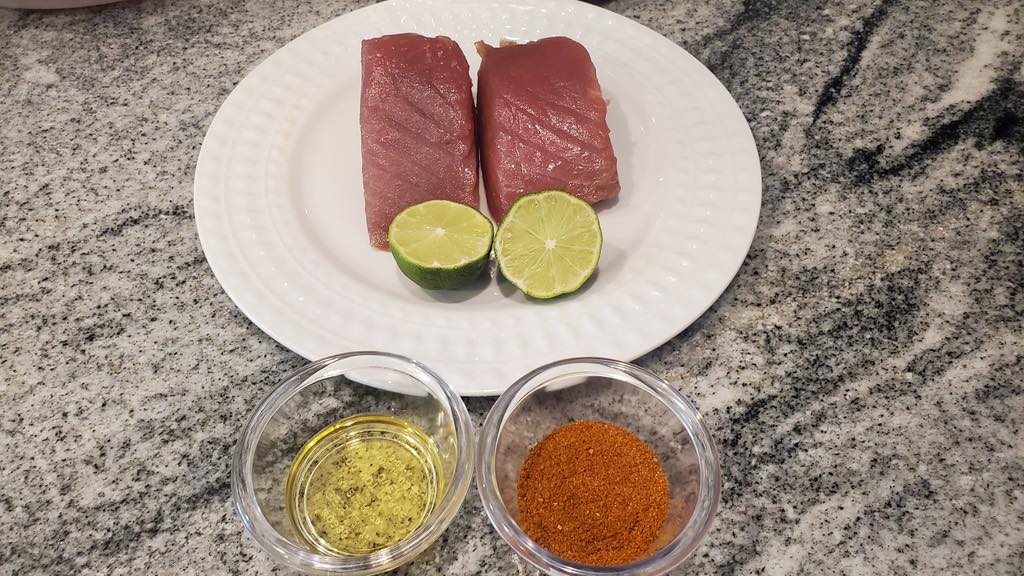 Seasoning tuna steaks