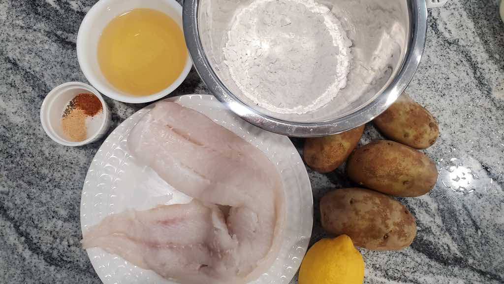 The ingredients used to make fish and chips are cod, potatoes, lemon juice, flour, light beer, old bay seasoning, salt, pepper and granulated garlic,