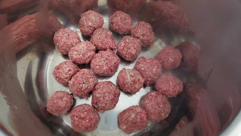 This is how you roll the Ikea meatballs and saute them in the instant pot.