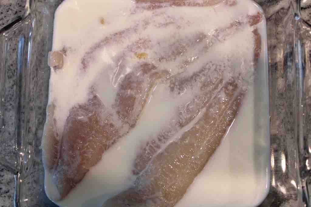 Soaking the fillets in homemade buttermilk.