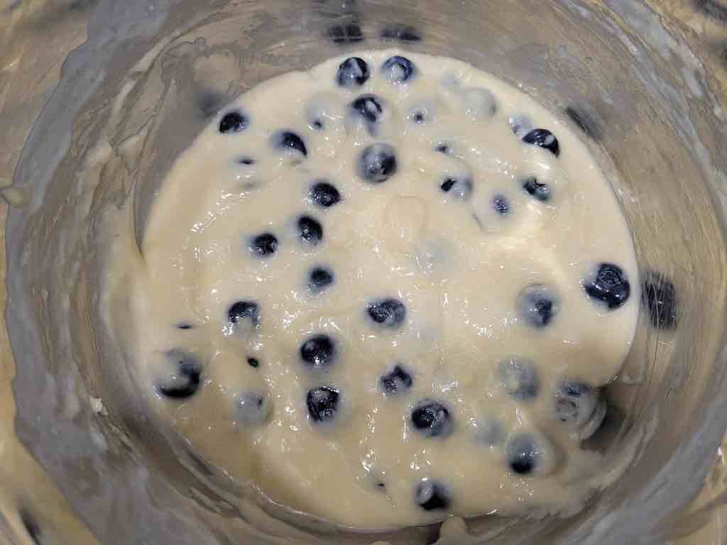 The batter should look as shown after folding in the blueberries.