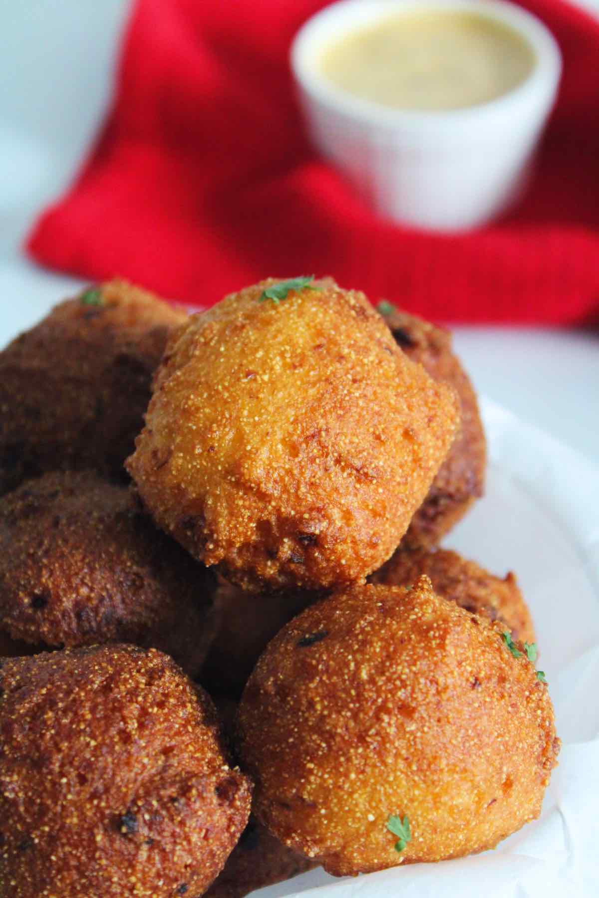 Deep fried cajun hush puppies make the perfect appetizer or side dish.