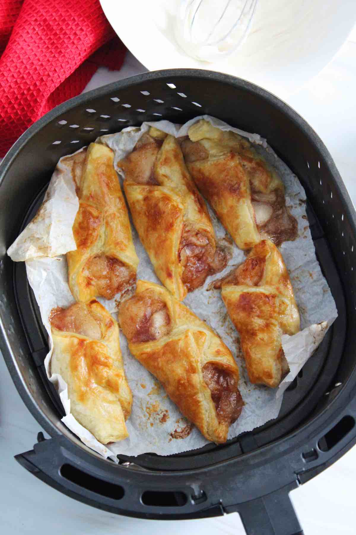 Easy air fryer apple turnovers made with puff pastry.