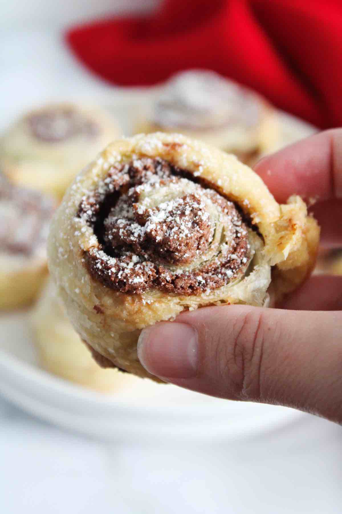 Baked Nutella pinwheels are made with puff pastry sheets and this is an up close look at them.