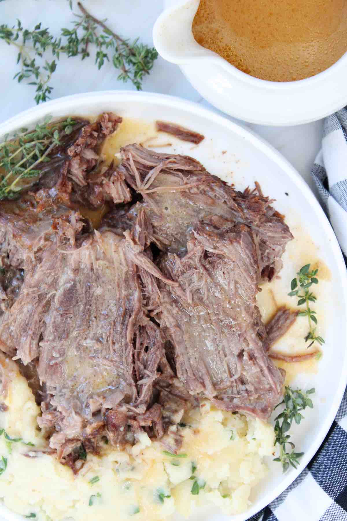Tender and juicy instant pot pot roast is perfectly cooked and packed with flavor.