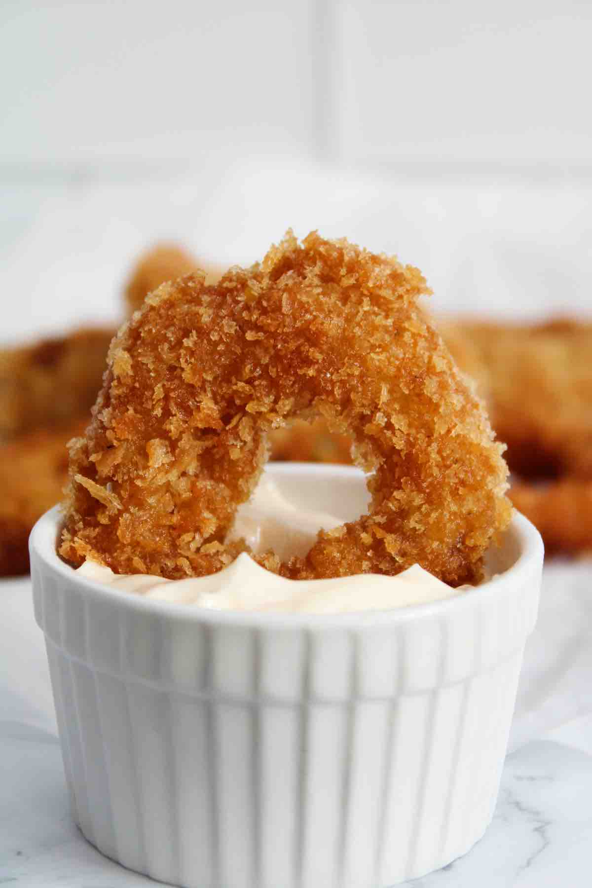 These seasoned onion rings are crispy and delicious.