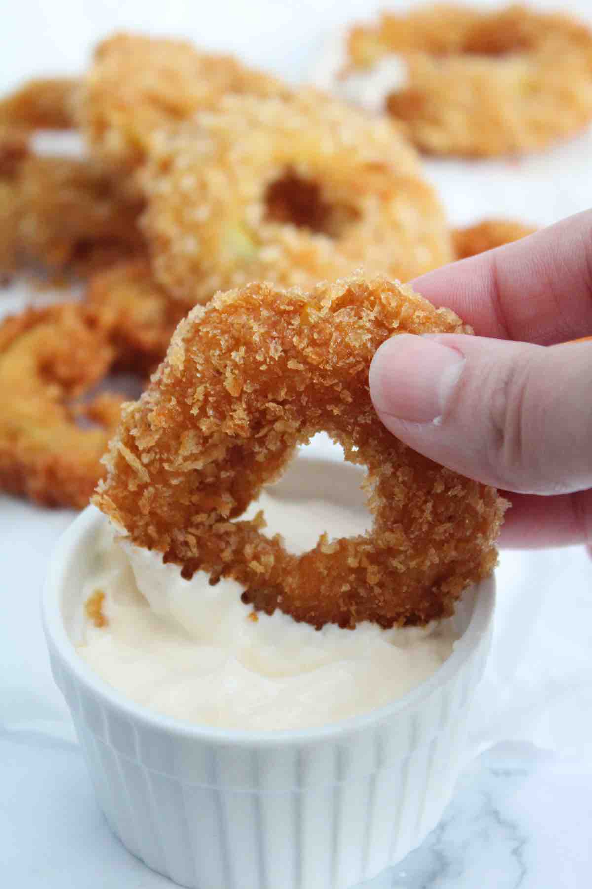 Copycat Kentucky Fried Chicken Onion Rings made in a buttermilk batter.