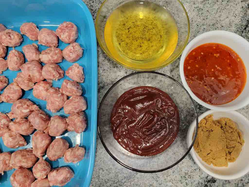 The ingredients needed are fresh Polish sausage, light beer, sweet chili sauce, barbecue sauce and brown sugar.