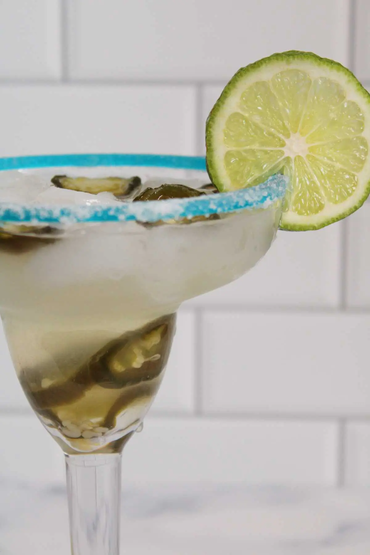 An easy recipe for spicy jalapeno margaritas made with homemade jalapeno simple syrup.