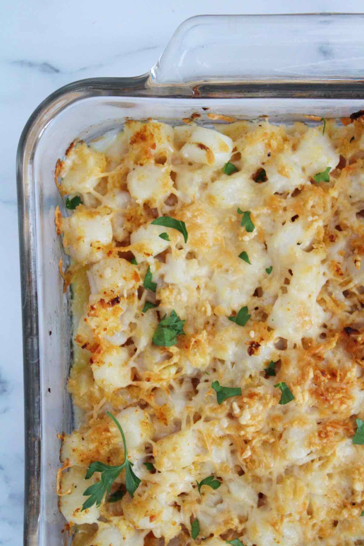 This recipe for baked cheesy scallops is made in under 20 minutes.